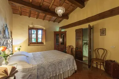 Letto o letti in una camera di Villa Il Paradisino