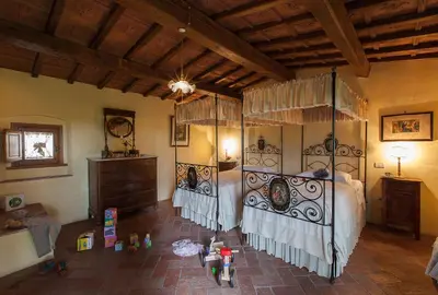 Letto o letti in una camera di Villa Il Paradisino