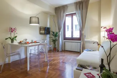 Area soggiorno di Apartments Florence - Le Por Santa Maria