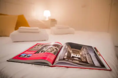 Letto o letti in una camera di Novella White