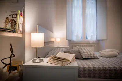 Letto o letti in una camera di Novella White