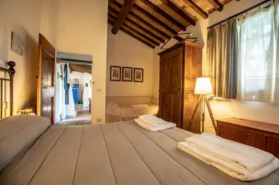 Letto o letti in una camera di Il Fienile del Vichiaccio