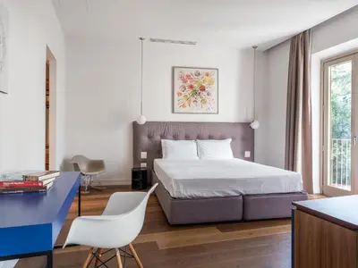 Letto o letti in una camera di Numa Florence Vita