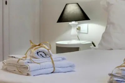 Letto o letti in una camera di Casa Campuccio -Appartamento Campuccio1 e Appartamento Campuccio 2