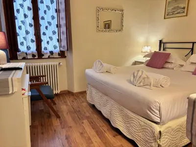 Letto o letti in una camera di Casa Campuccio -Appartamento Campuccio1 e Appartamento Campuccio 2