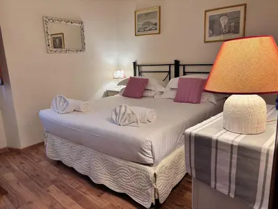 Letto o letti in una camera di Casa Campuccio -Appartamento Campuccio1 e Appartamento Campuccio 2