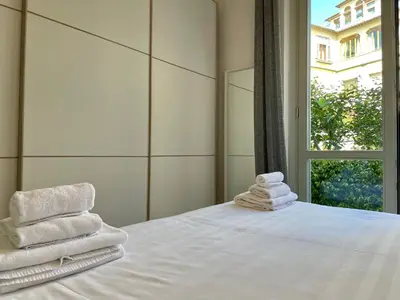 Letto o letti in una camera di Borgo Guelfo V