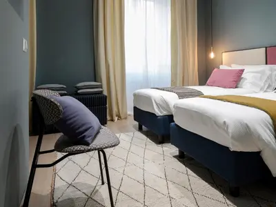 Letto o letti in una camera di Tornabuoni Place