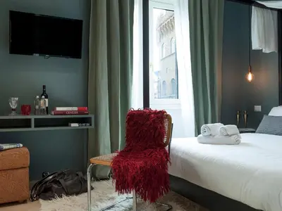 Letto o letti in una camera di Tornabuoni Place