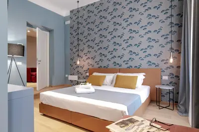 Letto o letti in una camera di Tornabuoni Place