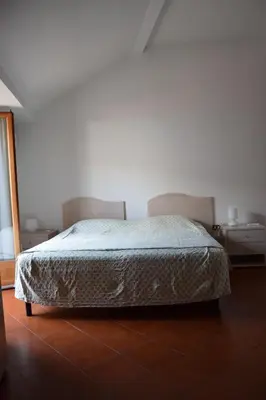 Letto o letti in una camera di Terrazza in borgo San Jacopo