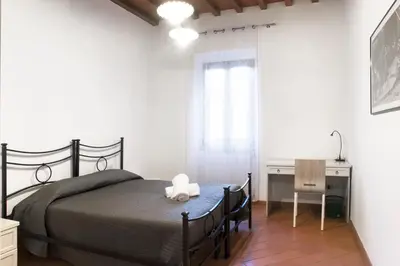 Letto o letti in una camera di Oriuolo Palace