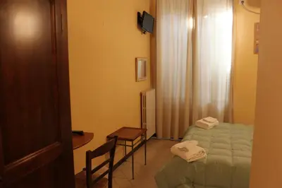 Letto o letti in una camera di Florence Decamerone B&B