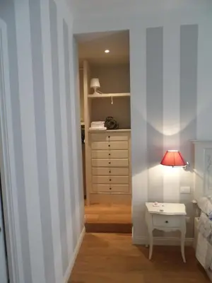 Letto o letti in una camera di Margherita Suite