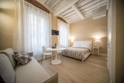 Letto o letti in una camera di Apartments Lorenzo&Lorenzo