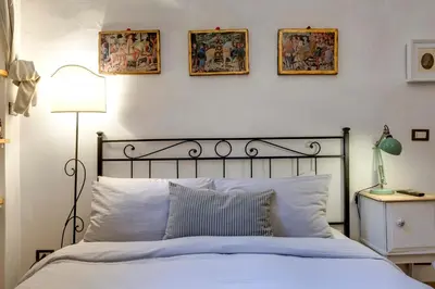 Letto o letti in una camera di Florence Holiday Homes Ponte Vecchio