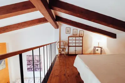 Letto o letti in una camera di Agriturismo Il Pintello