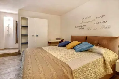 Letto o letti in una camera di Faenza Elegant Apartment