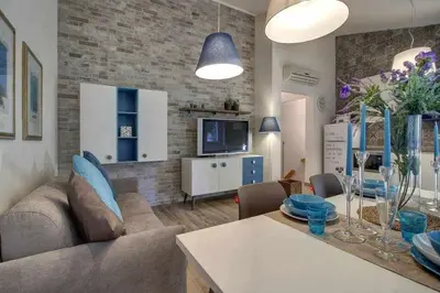 TV o dispositivi per l'intrattenimento presso Faenza Elegant Apartment