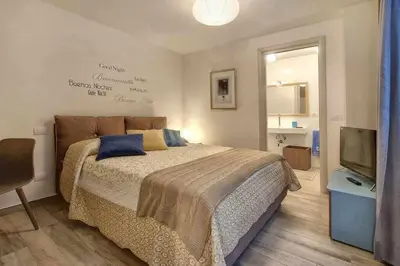 Letto o letti in una camera di Faenza Elegant Apartment