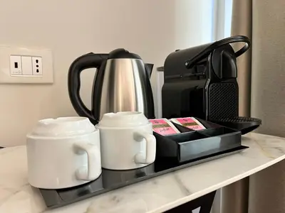 Set per la preparazione di tè e caffè presso Corte dei Sogni Boutique Hotel & spa