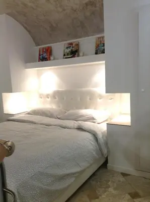 Letto o letti in una camera di Glamour Suite Duomo