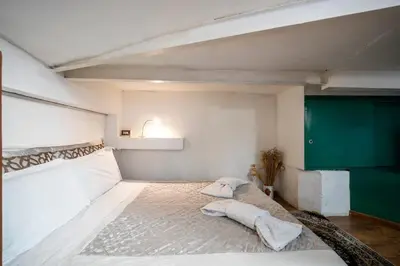 Letto o letti in una camera di 12 Duomo - Monolocale centrale e silenzioso