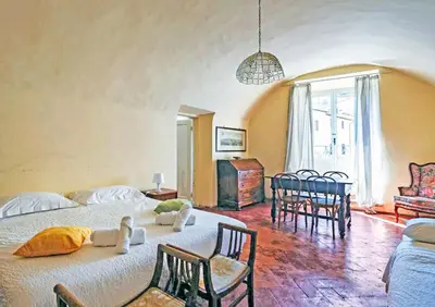 Letto o letti in una camera di Fiamma Apartment