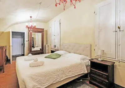 Letto o letti in una camera di Fiamma Apartment