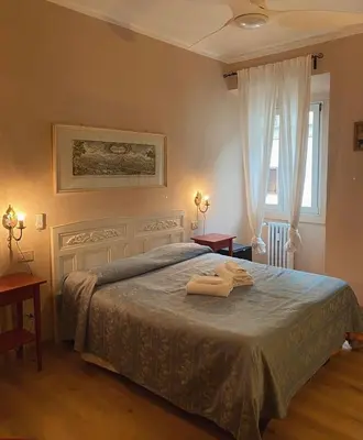 Letto o letti in una camera di Hotel Dali