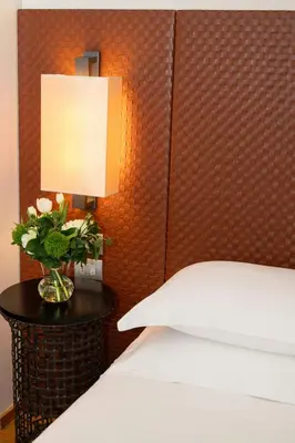 Letto o letti in una camera di Starhotels Michelangelo Florence