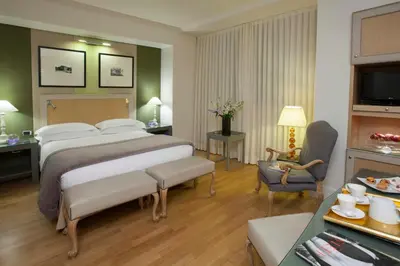 Letto o letti in una camera di Starhotels Tuscany