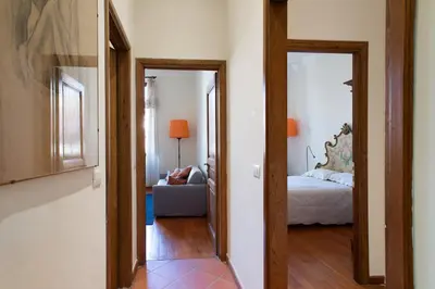 Letto o letti in una camera di Ponte Vecchio flat with elevator