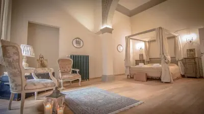 Letto o letti in una camera di Stunning Apt 5min Walk to Duomo
