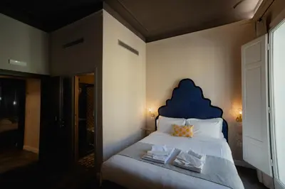 Letto o letti in una camera di La Fonderia Firenze