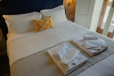 Letto o letti in una camera di La Fonderia Firenze