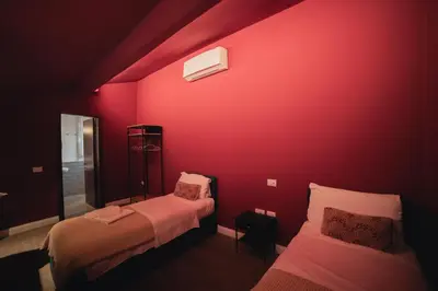 Letto o letti in una camera di La Fonderia Firenze