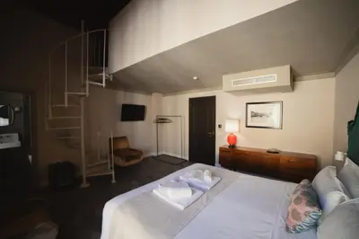 Letto o letti in una camera di La Fonderia Firenze