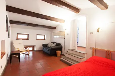 Area soggiorno di Riverside Apartment in Florence