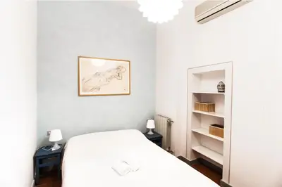 Letto o letti in una camera di Riverside Apartment in Florence