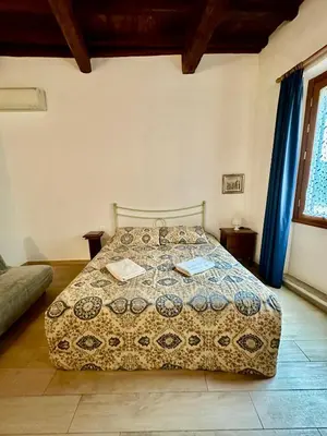 Letto o letti in una camera di Medici Suite - Appartamento Vintage 200m dal Duomo