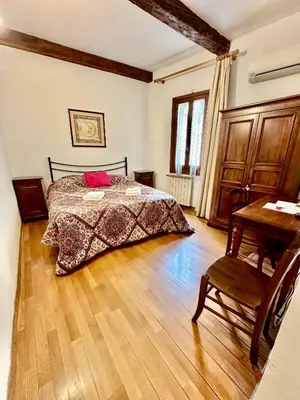 Letto o letti in una camera di Medici Suite - Appartamento Vintage 200m dal Duomo