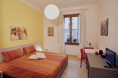 Letto o letti in una camera di Bianca B&B