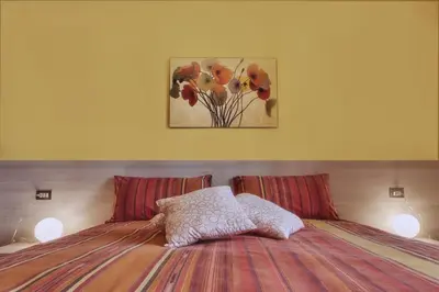 Letto o letti in una camera di Bianca B&B