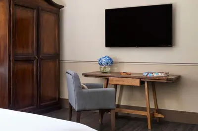 TV o dispositivi per l'intrattenimento presso Tivoli Palazzo Gaddi Firenze Hotel