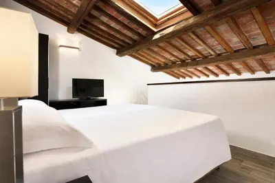 Letto o letti in una camera di FH55 Med Guesthouse