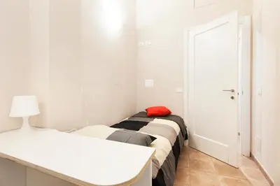 Letto o letti in una camera di San Lorenzo Palace