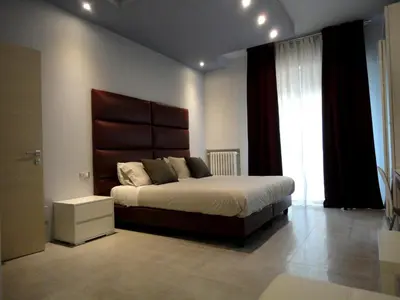 Letto o letti in una camera di The Flat 233