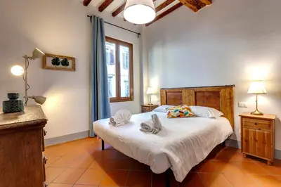 Letto o letti in una camera di Zeno Apartment by Mamo Florence