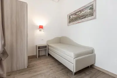 Letto o letti in una camera di Apollo Guest House